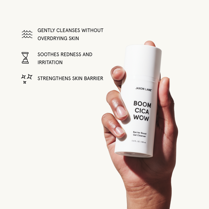 Hand holding boom cica wow with text about its benefits on a white background