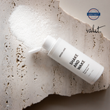 Product View 8 Skincare bottle labeled 'Shake and Wake' by JAXON LANE on a textured surface with 'valet' branding.