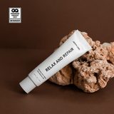 Product View 5 Tube of 'Relax and Repair' cream on a brown background with GQ Grocerio Awards 2021 winner badge.