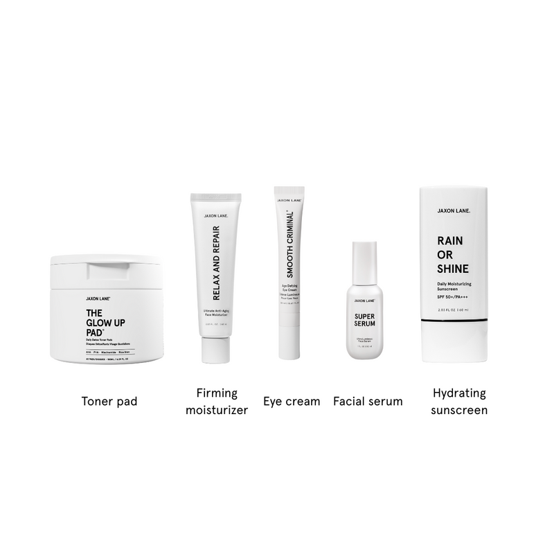 Collection of skincare products with labels on a white background