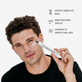 Product View 3 Man applying eye cream with product labeled 'Smooth Criminal' on a white background